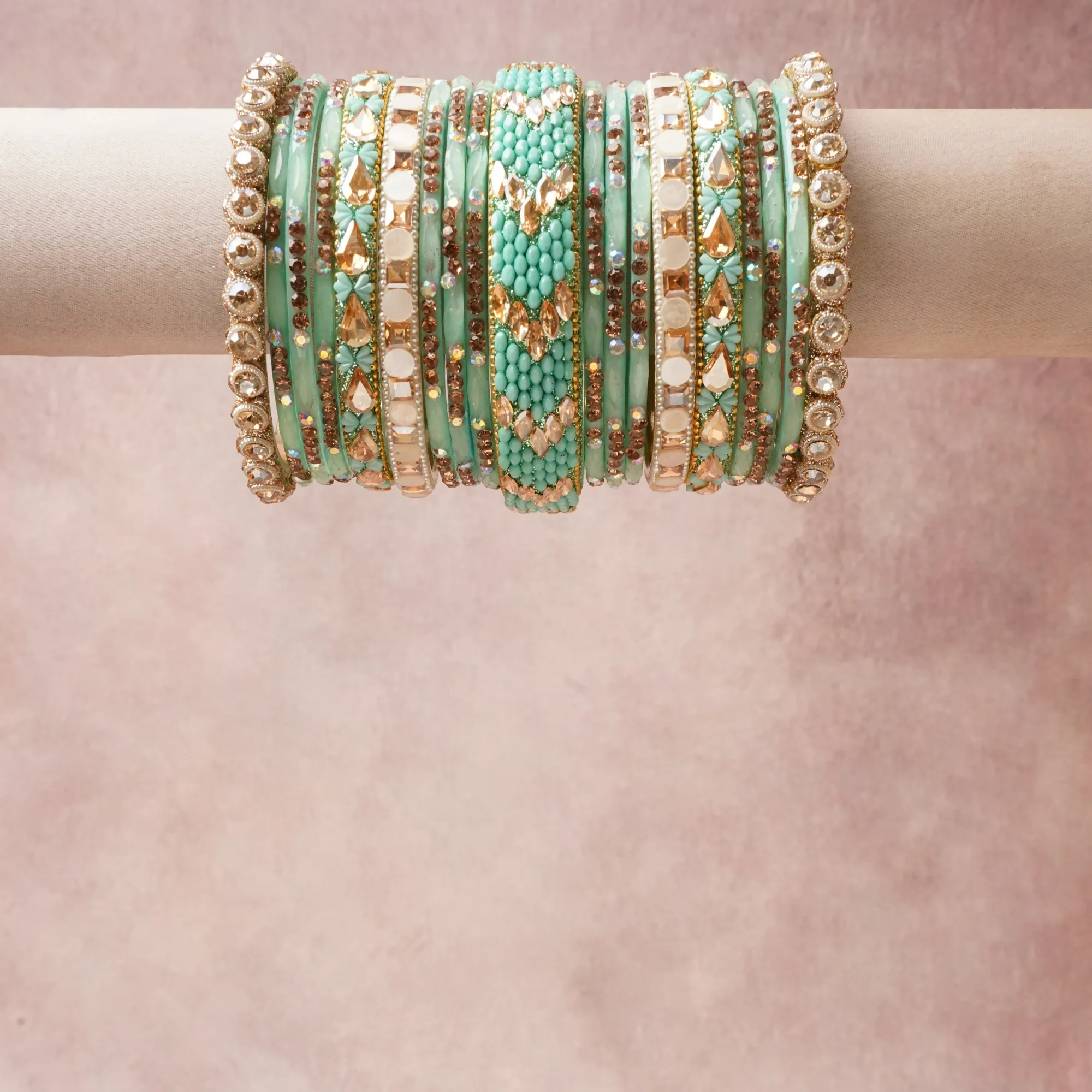 A commanding Mint Green anchors this beautiful set, enriched with accents of Gold, Clear Crystal, Cream that add depth and dimension.

Featuring a striking composition of Glass, Base Metal, Crystal, Glass Seed Beads, Resin, this set carries intricate craftsmanship and strong presence. Grand in form, it is created for moments that deserve to be marked.